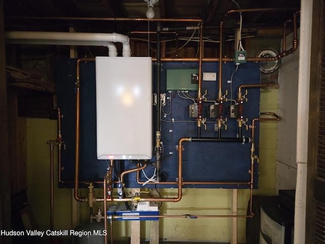 utility room with water heater