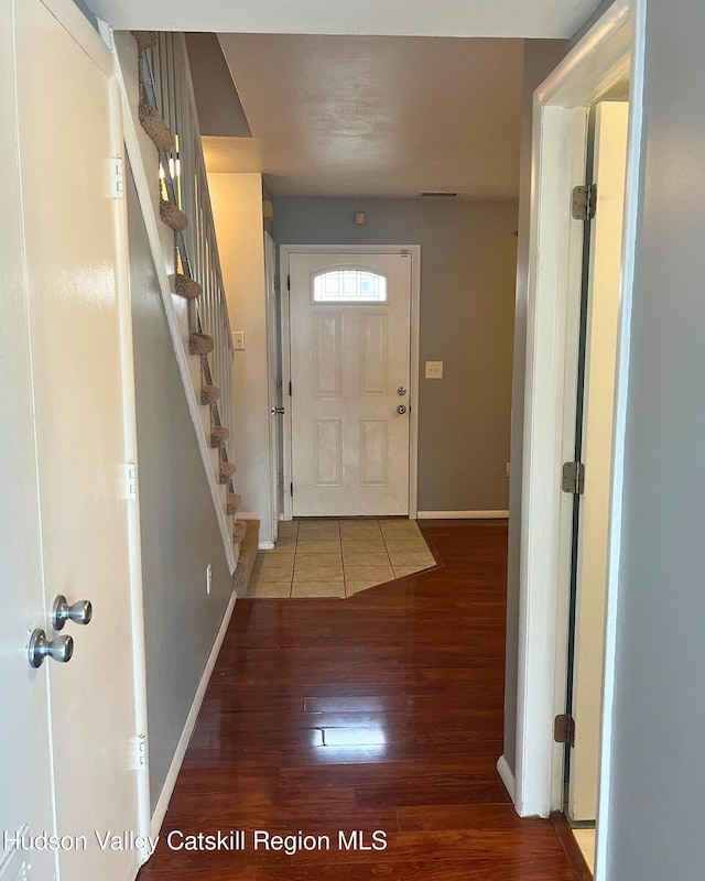 doorway featuring hardwood / wood-style floors