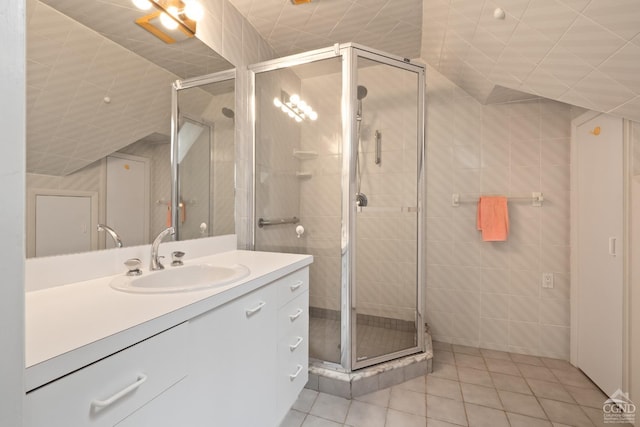 57 Spencer Rd, Austerlitz, NY 12017 - bathroom featuring tile patterned floors, vanity, a stall shower, and tile walls