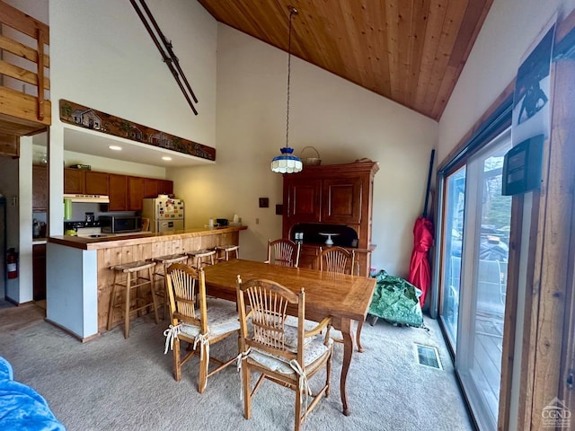 50 Windham Mt Village Rd, Windham, NY 12496 - dining space with light carpet, wood ceiling, and high vaulted ceiling