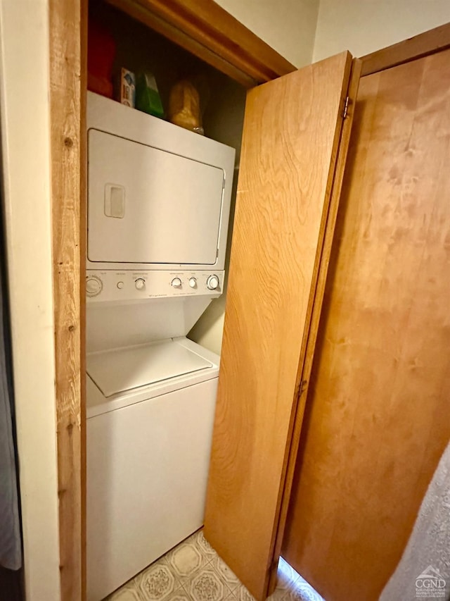 50 Windham Mt Village Rd, Windham, NY 12496 - clothes washing area featuring stacked washer / dryer