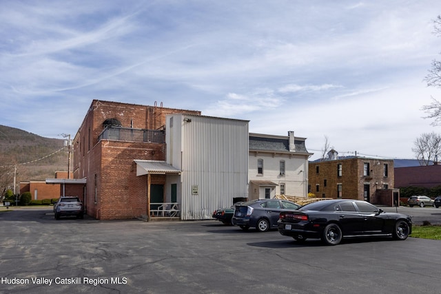 81 N Main St, Ellenville, NY 12428 - view of property with uncovered parking