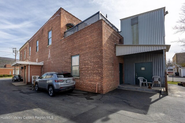 81 N Main St, Ellenville, NY 12428 - exterior space featuring brick siding