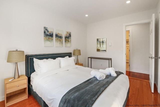 bedroom featuring hardwood / wood-style flooring