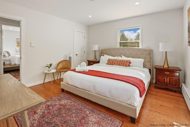 bedroom featuring light hardwood / wood-style flooring