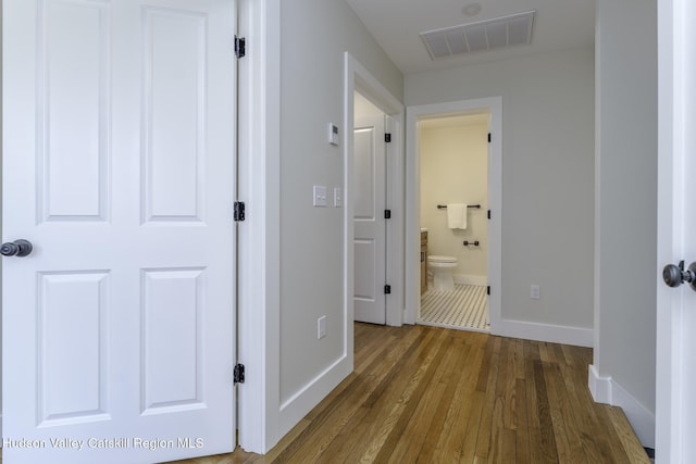 hall featuring wood-type flooring