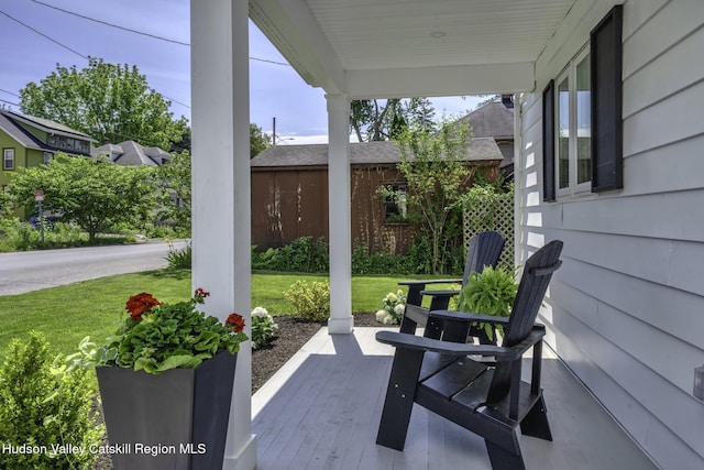 view of patio featuring a porch