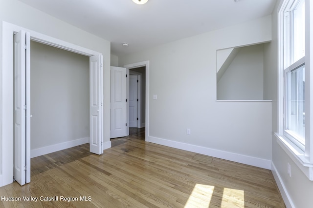 unfurnished bedroom featuring light hardwood / wood-style flooring