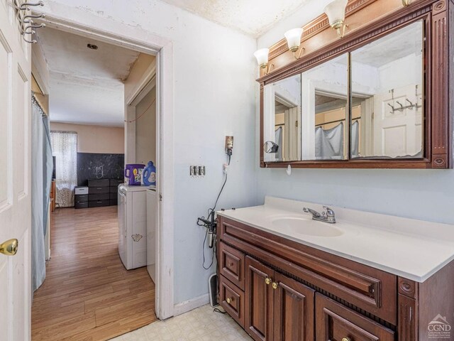 1769 Rte 51, Hannacroix, NY 12087 - bathroom featuring washing machine and dryer and vanity