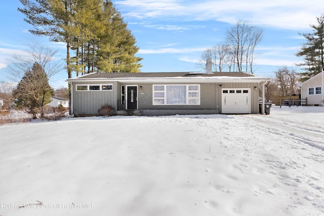 view of front of home with board and batten siding and a garage