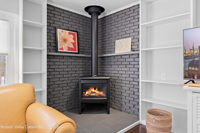 details featuring a wood stove and built in features