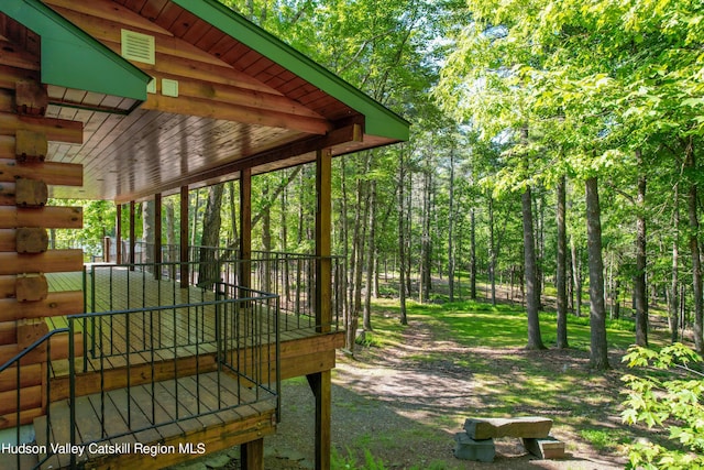 surrounding community featuring a deck