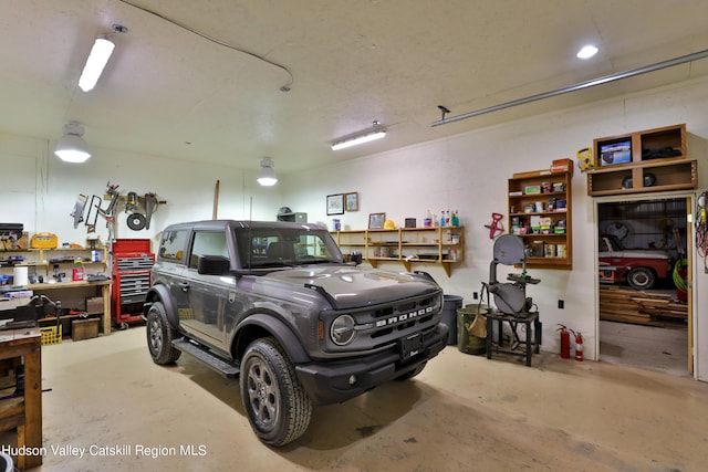 garage featuring a workshop area