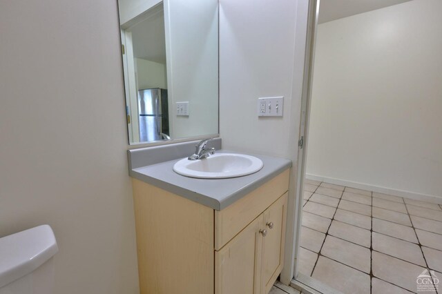 15023 Rte 23 Unit 5, Prattsville, NY 12468 - half bathroom with vanity, toilet, and tile patterned floors