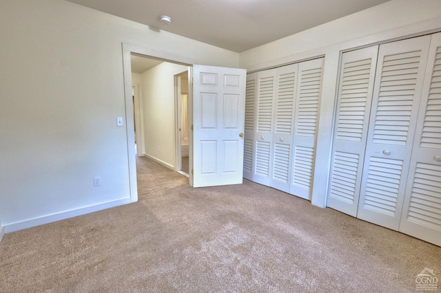 15023 Rte 23 Unit 5, Prattsville, NY 12468 - unfurnished bedroom with carpet floors, two closets, and baseboards
