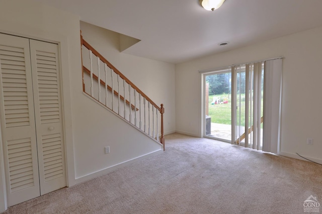 15023 Rte 23 Unit 5, Prattsville, NY 12468 - carpeted foyer entrance featuring stairs and baseboards