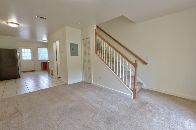 15023 Rte 23 Unit 5, Prattsville, NY 12468 - unfurnished living room featuring electric panel, light colored carpet, stairway, and baseboards