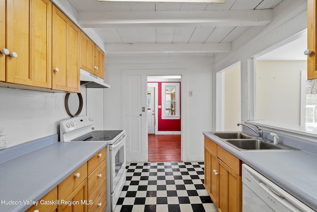kitchen featuring tile patterned floors, white appliances, under cabinet range hood, beamed ceiling, and a sink