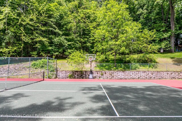 87 Boice Mill Rd, Kerhonkson, NY 12446 - view of tennis court featuring a wooded view