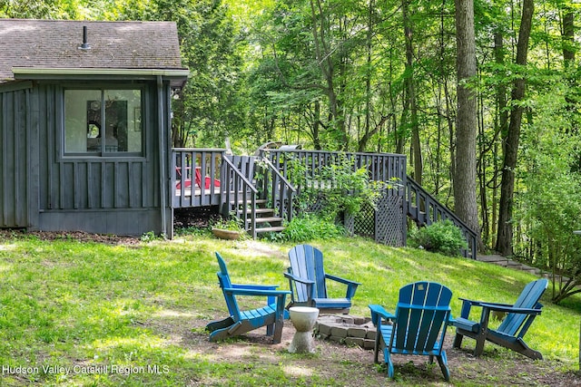 87 Boice Mill Rd, Kerhonkson, NY 12446 - view of green lawn with an outdoor fire pit, a wooden deck, and stairway
