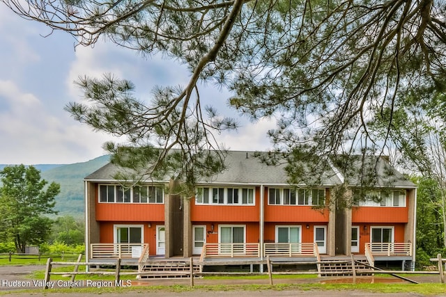 61 Scribner Hollow Rd Unit B 1, Hunter, NY 12442 - view of front of house with a mountain view and a shingled roof