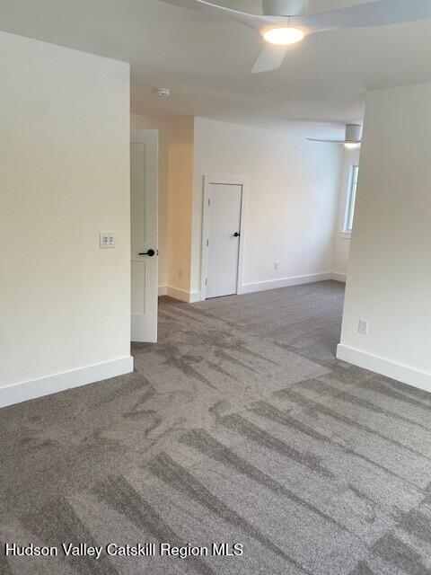 unfurnished bedroom featuring ceiling fan, light hardwood / wood-style floors, and a closet