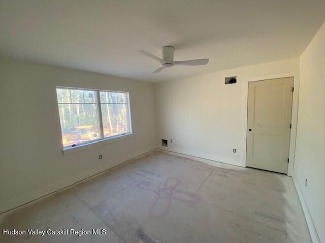 spare room featuring ceiling fan