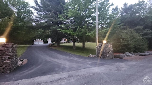 view of asphalt driveway