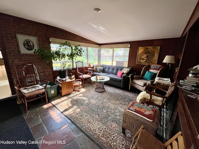 24 Linden Ave, Red Hook, NY 12571 - living room featuring stone tile floors and vaulted ceiling