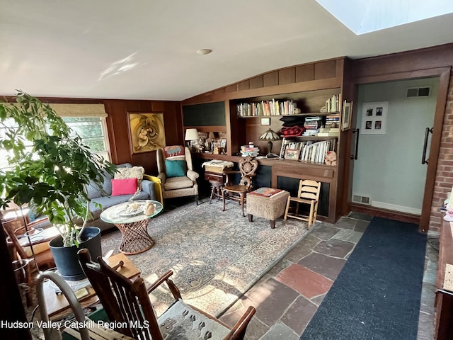 24 Linden Ave, Red Hook, NY 12571 - living area with stone tile flooring and lofted ceiling