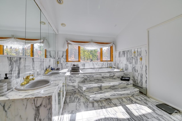 108 Botti Dr, Hunter, NY 12442 - full bathroom with a bath, lofted ceiling, double vanity, and backsplash