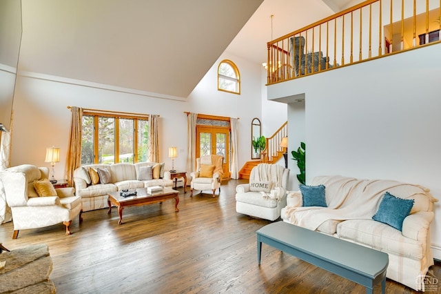 108 Botti Dr, Hunter, NY 12442 - living room featuring high vaulted ceiling, stairway, and wood finished floors