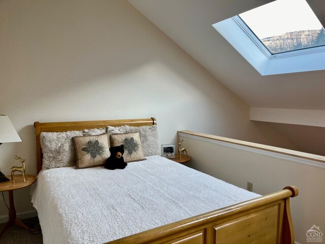 64 Liftside Dr Unit E-5, Hunter, NY 12442 - bedroom with a skylight and lofted ceiling