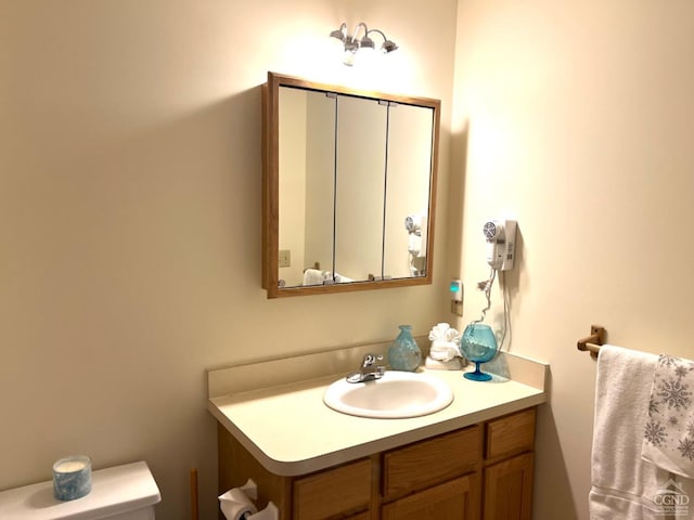 64 Liftside Dr Unit E-5, Hunter, NY 12442 - half bathroom featuring vanity and toilet