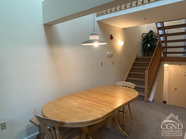 64 Liftside Dr Unit E-5, Hunter, NY 12442 - dining area with stairway and carpet floors