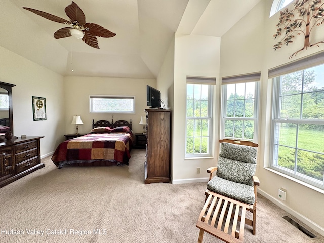 2914 Sleepy Hollow Rd, Athens, NY 12015 - carpeted bedroom with multiple windows, lofted ceiling, and a ceiling fan
