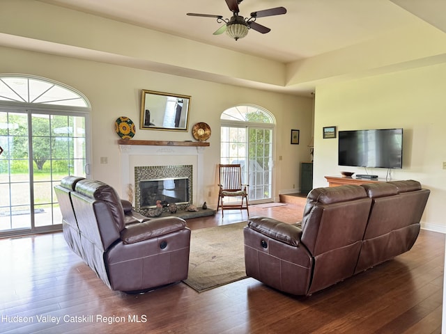 2914 Sleepy Hollow Rd, Athens, NY 12015 - living area with wood-type flooring, a glass covered fireplace, and ceiling fan
