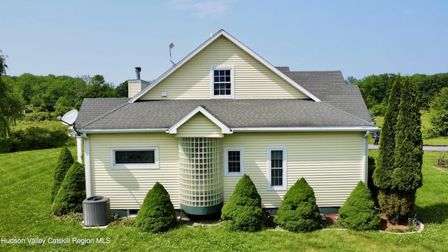 2914 Sleepy Hollow Rd, Athens, NY 12015 - back of property with a yard, roof with shingles, and a chimney