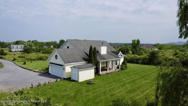 2914 Sleepy Hollow Rd, Athens, NY 12015 - view of side of property with a lawn, a shed, and a porch
