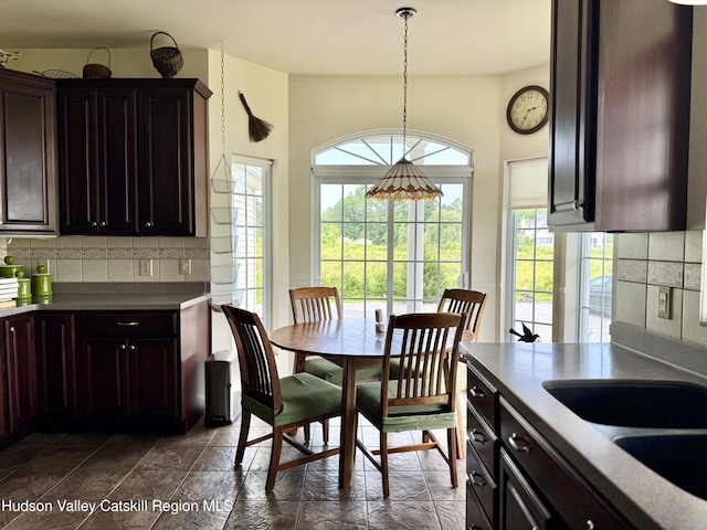 2914 Sleepy Hollow Rd, Athens, NY 12015 - dining room with dark stone finish flooring