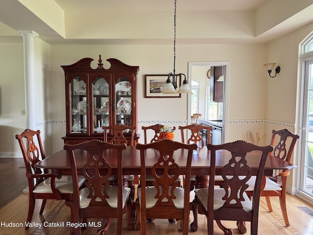 2914 Sleepy Hollow Rd, Athens, NY 12015 - dining space with light wood-style floors and decorative columns
