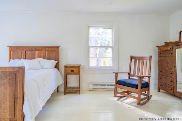 bedroom featuring baseboard heating