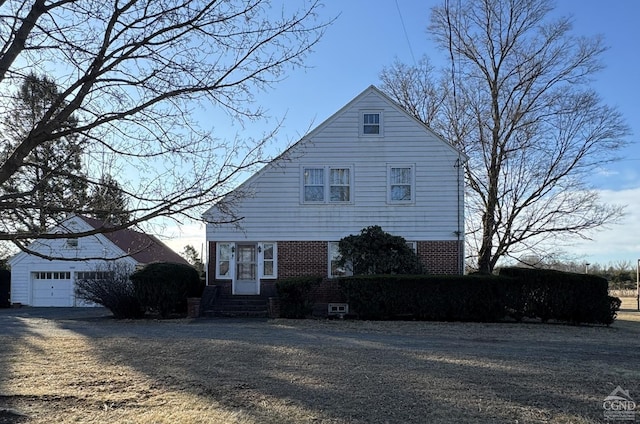 2322 US Route 9, Hudson, NY 12534 - view of front facade featuring an outdoor structure, entry steps, and brick siding