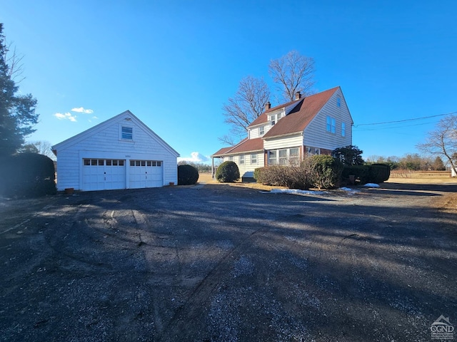 2322 US Route 9, Hudson, NY 12534 - view of side of property with a garage and an outbuilding