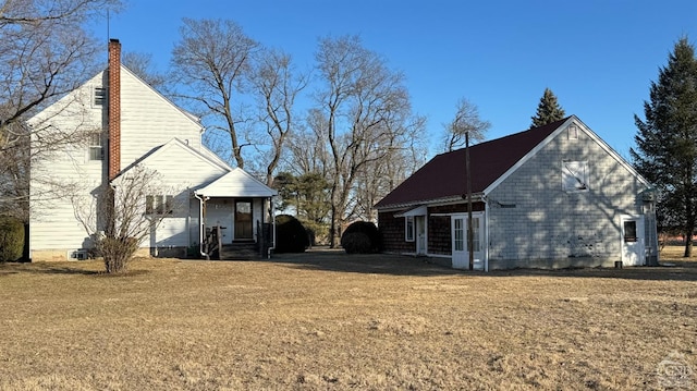 2322 US Route 9, Hudson, NY 12534 - view of property exterior with a chimney and a yard