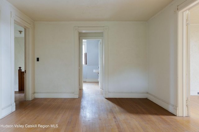 unfurnished room featuring light hardwood / wood-style flooring