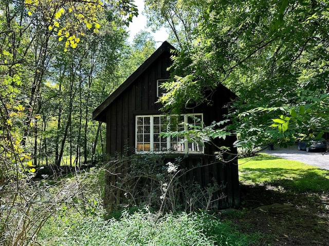 view of side of property with board and batten siding