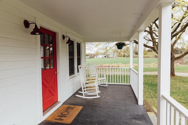 422 County Route 9, Ghent, NY 12075 - view of exterior entry featuring covered porch and a yard