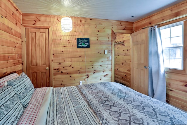 bedroom with wooden walls