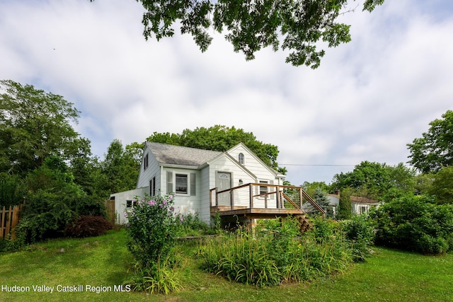 219 Rte 32, New Paltz, NY 12561 - back of property with a lawn and a deck